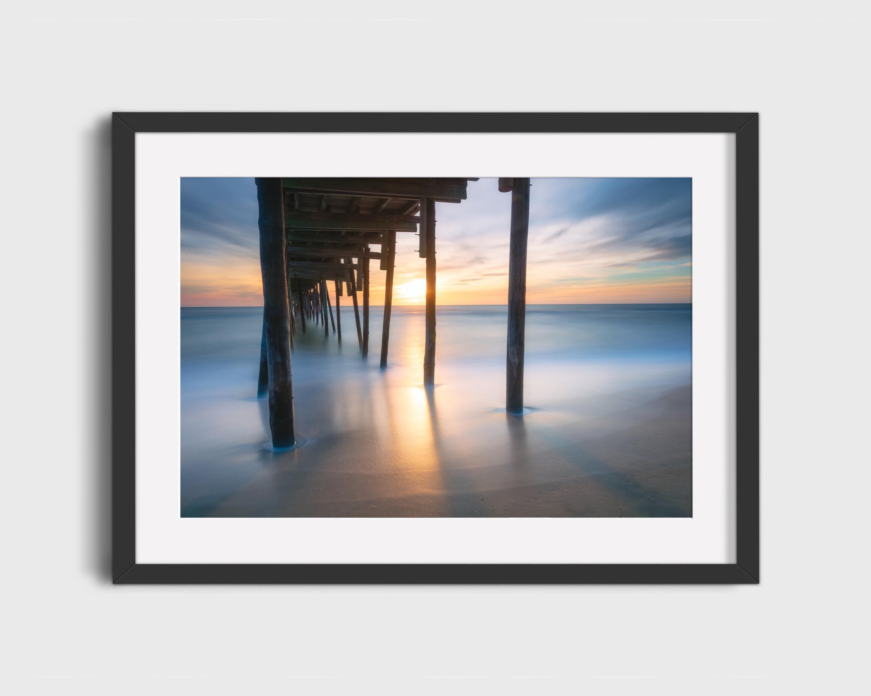 Ocean Sunrise Under Pier