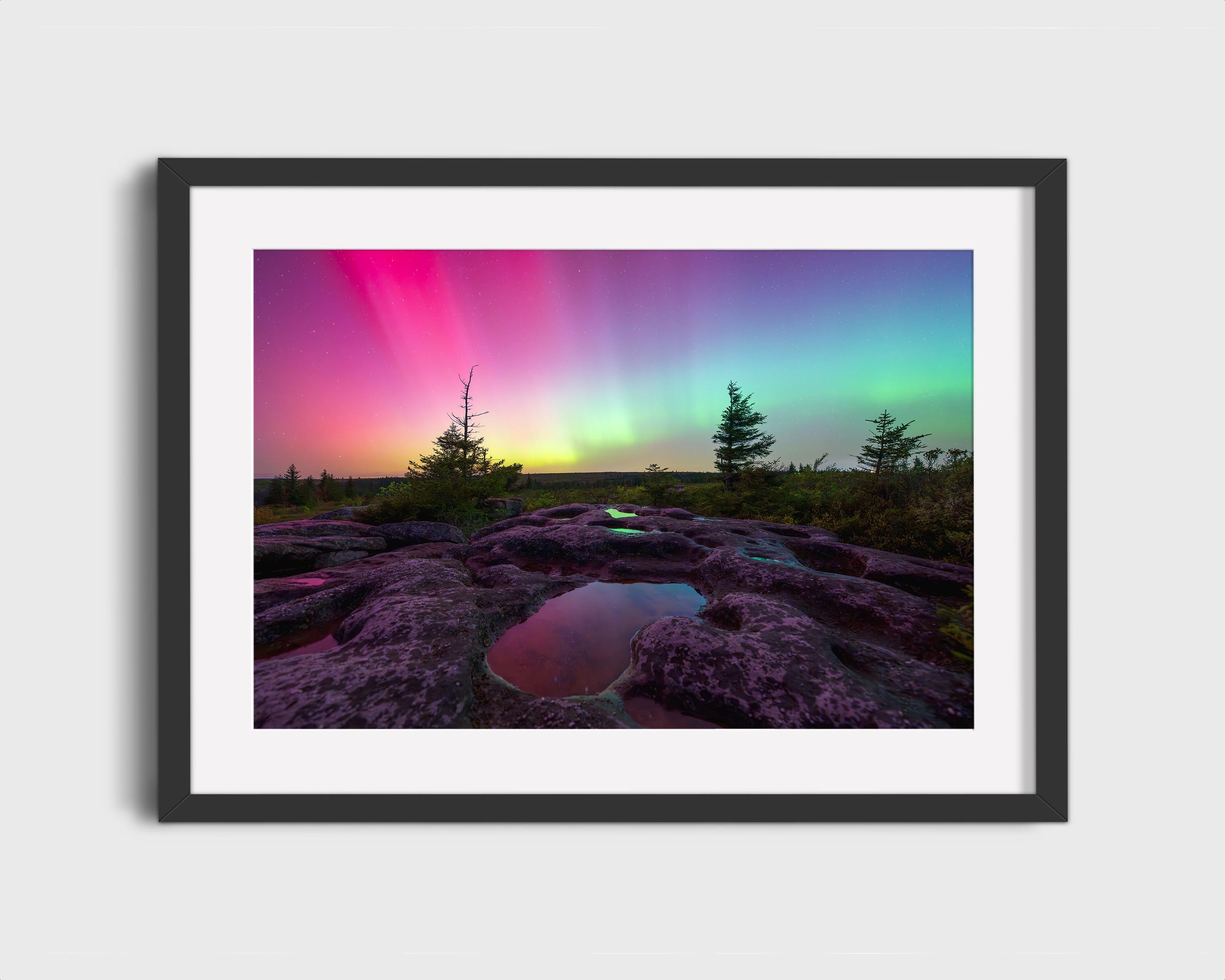 Vibrant Aurora Over Bear Rocks