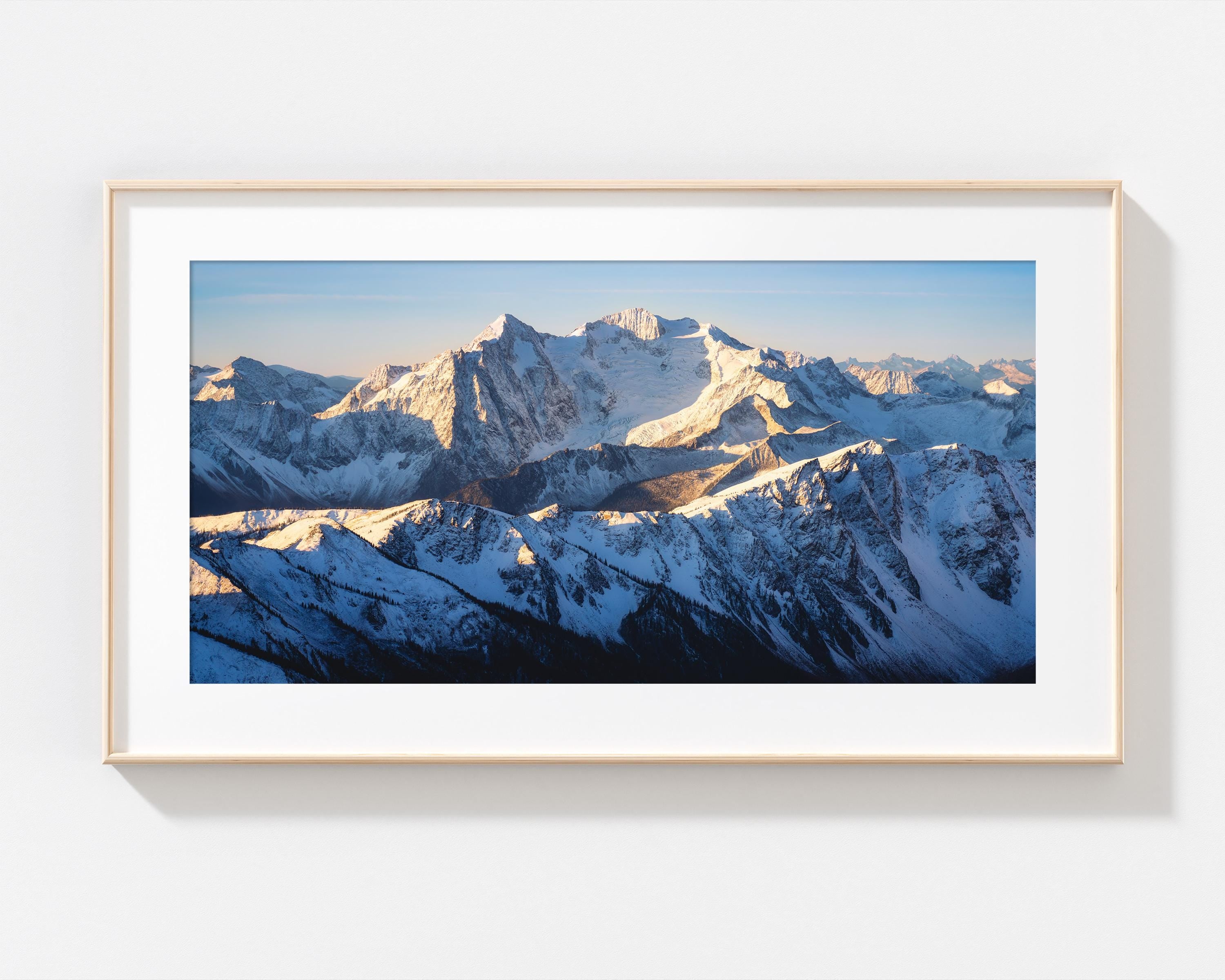 Snow-Covered Rockies at Sunrise